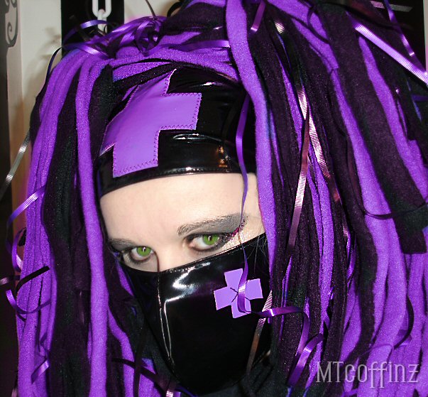 This Headband is made from Stretchy Black PVC with a Bright Purple PVC 